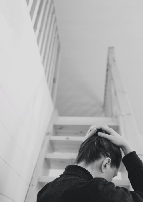 a person standing in front of a stair case